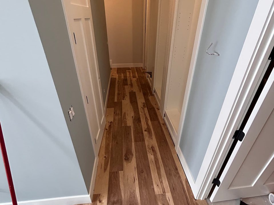 Hardwood flooring installed down a hallway in Grand Rapids, Michigan