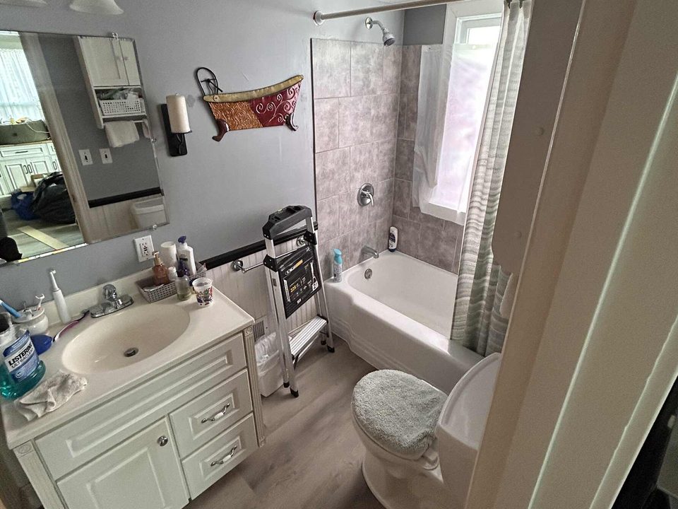 New laminate flooring installed in a Grand Rapids bathroom