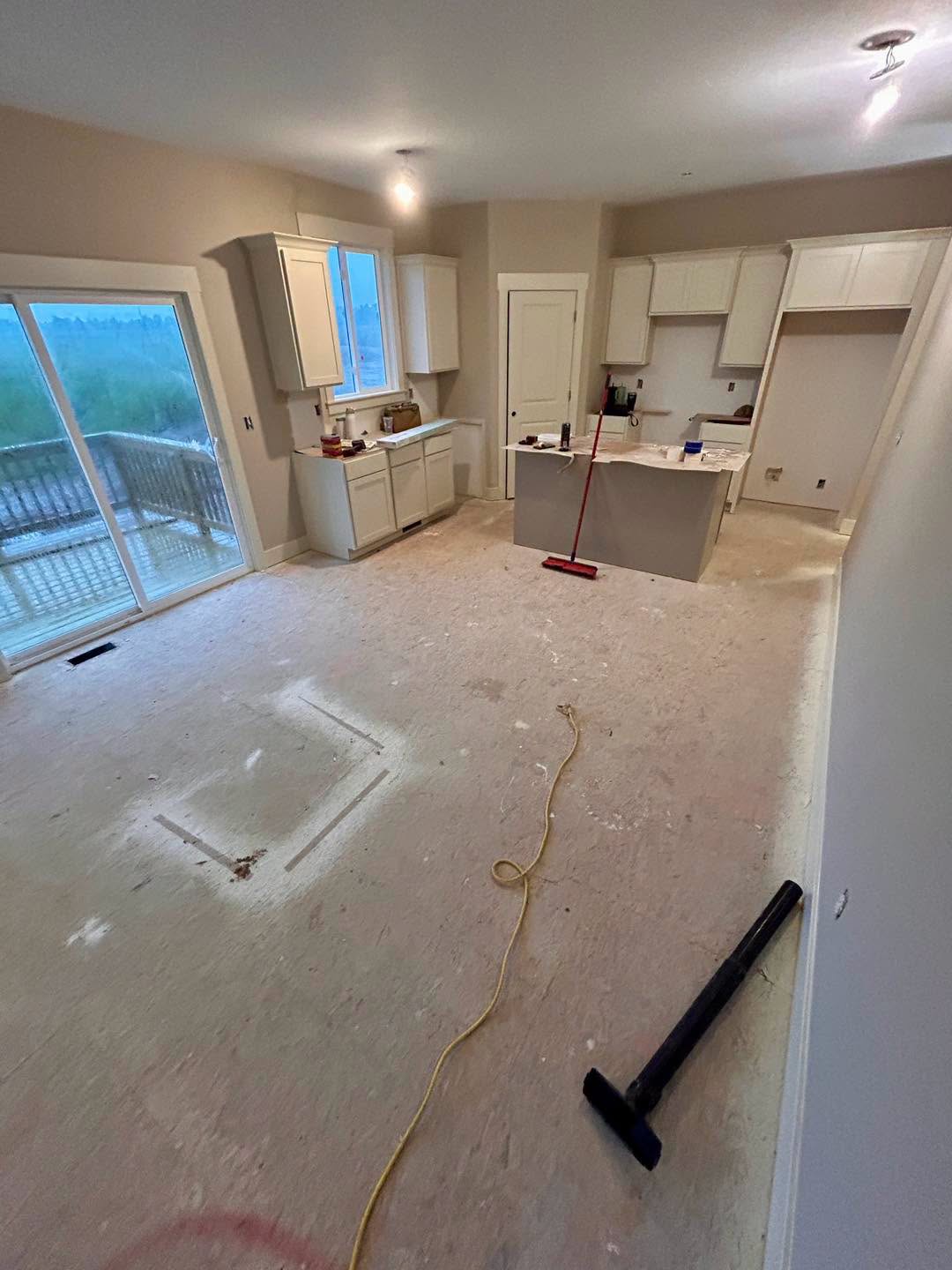 Kitchen subfloor before flooring installation.